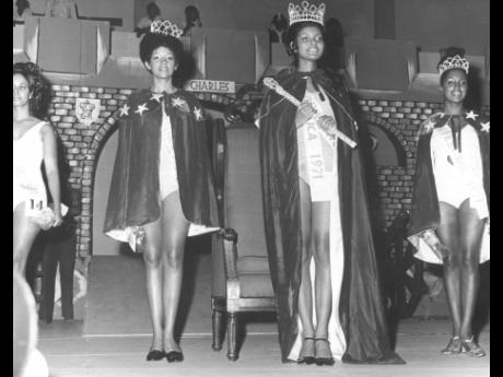 Miss Jamaica 1971, Ava Joy Gill, is flanked by Miss Independence, Marilyn Wright (left), and Miss Festival, June Ramsay, as they are about to start their ceremonial walk after their coronation at the National Arena in 1971.