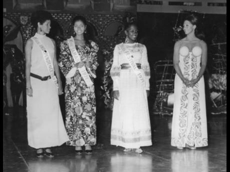 Four beauties are presented to the audience at the National Arena during the intermission at the Costume Queens show. From left: Miss Independence Marilyn Wright; Miss Jamaica Ava Gill; Miss Festival June Ramsay and Miss World 1970 Jennifer Hosten. Miss Ja
