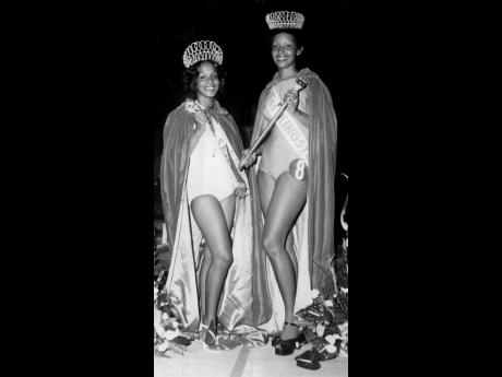 Pauline Matadeen (left), Miss St Andrew 1774 and Andrea Lyons, Miss Kingston 1974, posed as they were crowned at Vale Royal on Friday.
