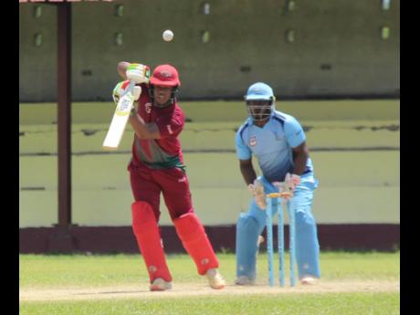 Melbourne CC captain Javelle Glenn in action at Chedwin Park last Saturday as he scored a half-century to guide his team to an eight-wicket win over St Ann in their Jamaica Cricket Association All-Island Limited overs (50-over) semi-final.  Looking on is w