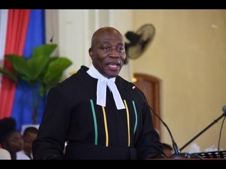 Chief Justice Bryan Sykes speaking at the Annual Assize Church Service to mark the Michaelmas Term session of the Trelawny Circuit Court at the William Knibb Memorial Baptist Church in Falmouth, Trelawny.