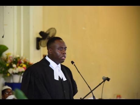 Michael Hemmings, president of the Cornwall Bar Association, addresses the Annual Assize Church Service at the William Knibb Memorial Baptist Church in Falmouth, Trelawny on Sunday.