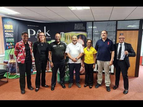 Senator Aubyn Hill (third left) is joined by Pak’s Cosmetics CEO Peter Mudahy (centre) after a tour of the head office in Harlow Essex. From left are:  Kelli-Dawn Hamiliton from the Jamaica Special Economic Zone Authority,  Judith Slater, Britain’s hig