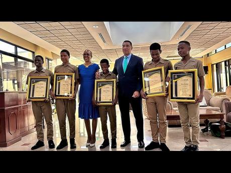 Prime Minister Andrew Holness and Fayval Williams, minister of education and youth, met with the five students who saw the need for swift medical care for a fellow BB Coke student who was badly beaten by another student last Friday. The students, Leon Barn