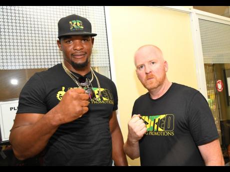Rudolph Brown/Photographer
Ricardo 'Big 12' Brown (left) and his promoter, Tyler Buxton of United Boxing Promotions, at SureTime Medical Centre on Trafalgar Road in New Kingston on Friday, October 6, 2023.