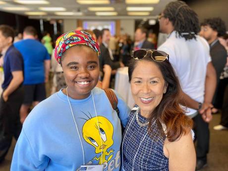 Shaneen Shirley (left), who won the Chin-Loy Chang Award for Caribbean Students in the 2022-2023 school year, is seen here with Donette Chin-Loy Chang at the 20th anniversary reception at The Chang School.