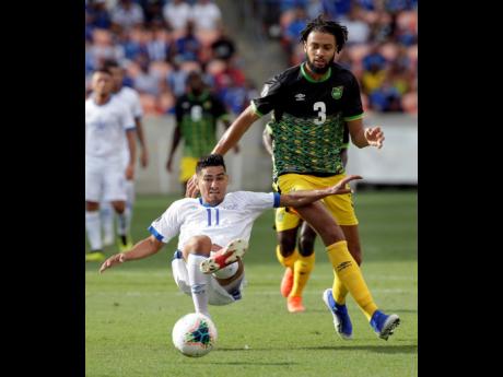 Defender Michael Hector (right) in action against El Salvador during a 2019 Concacaf Gold Cup match  in Houston, Texas. 
