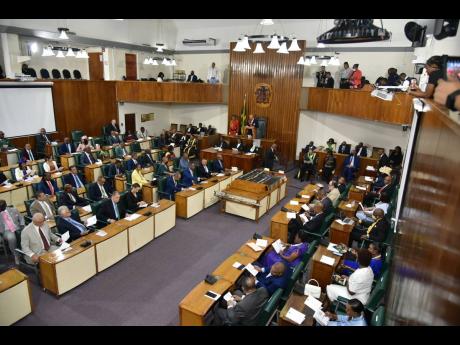 In this February photo, Governor General Patrick Allen delivers the Throne Speech. Mark Wignall writes: If there is a creature known as the typical Jamaican politician then the more he survives elections, the more of a hustler he becomes. 