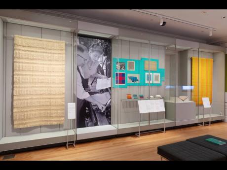 A collection of textiles, part of the exhibit, “A Dark, A Light, A Bright: The Designs of Dorothy Liebes”. 
