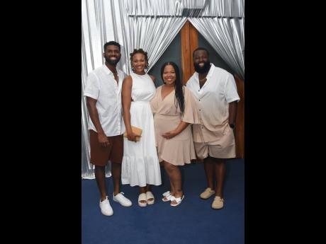 Colour-coordinated in earth tones are (from left) Darrin Martin, his wife Ashley, and Natasha and Terrence Melton.