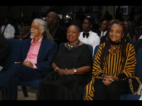 From left, Tommy Cowan, Minister of Culture Olivia Grange and Carlene Davis enjoy the performances at the Sterling Gospel Music Awards.