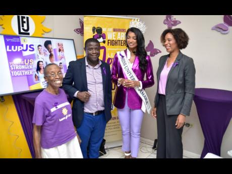 Veteran lupus warrior and Lupus Foundation of Jamaica (LFJ) volunteer, Marjorie Allen (left), shares a light moment with Everton Anderson, CEO of the National Health Fund; Miss Jamaica Universe 2023, Dr Jordanne Levy, and president of the LFJ, Desiree Tull