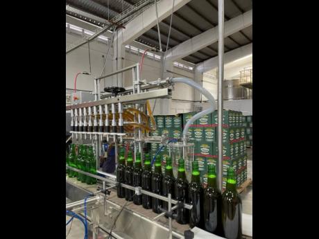 Bottles of Stone’s Original Green Ginger Wine on the assembly line.