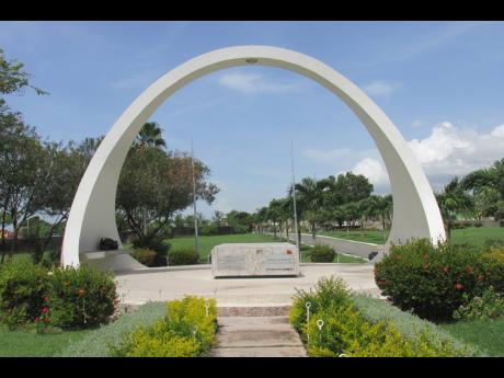 The monument for National Hero Alexander Bustamante at National Heroes Park in Kingston.