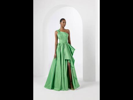 Tami Williams, pictured in a new gorgeous green Murad gown, from his collection unveiled on the final day of Paris Fashion Week.