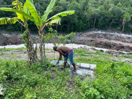 Seven graves belonging to family members of 61-year-old Euriel ‘Charlie’ Francis will have to be relocated from the Salt Spring community in St James.