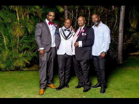 Here to celebrate the happily-ever-after! From left: brother, Alvin Patrick; groom, Randevon Patrick; father, Alvin Patrick; and brother, Craig Patrick.