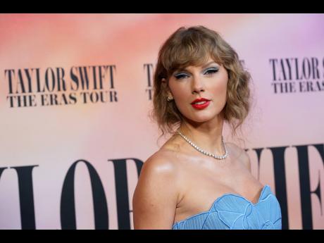 Taylor Swift arrives at the world premiere of the concert film ‘Taylor Swift: The Eras Tour’.