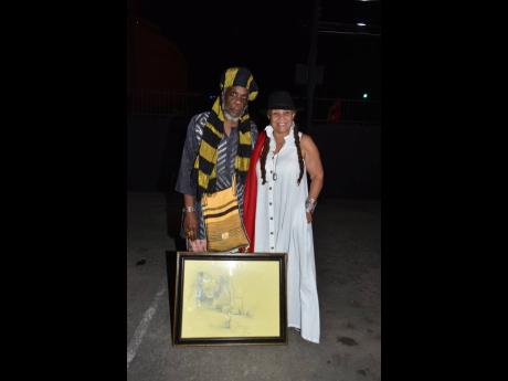 
Jamaican dub poet Mutabaruka (left) and his designer wife Jackie ‘Amba’ Cohen-Hope arrived cradling their own contribution to the Peter Tosh Museum, a portrait they have owned for more than 15 years. 