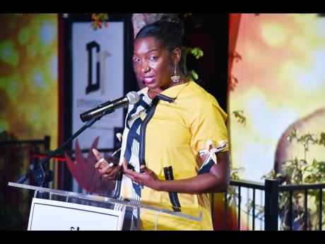Niambe McIntosh, Peter Tosh’s daughter, speaks at the event marking the reopening of the Peter Tosh Museum.