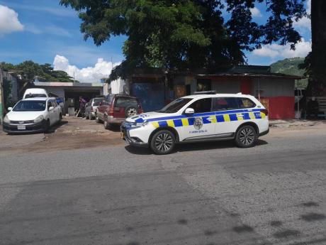 The police were on location at 35 Gordon Town Road in St Andrew yesterday.