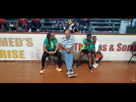 Coach Sandra Riette (left) chats with Jamaica’s five-time Caribbean men’s singles winner Orville Haslam at the 2022 Caribbean Mini and Pre-Cadet Championships in Guyana.