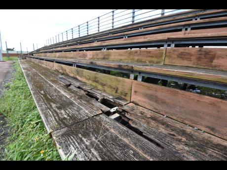 Only rotting wood remains of the seating stands at the basketball and netball Court inside the Sligoville Sports Complex in St Catherine.