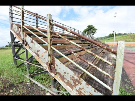 The rotting rails of the stands by the netball and basketball courts of the Sligoville Sports Complex in St Catherine.