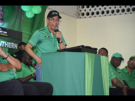 General Secretary of the Jamaica Labour Party (JLP), Dr Horace Chang, addressing officers, delegates and supporters of the JLP during the St James Southern Constituency Conference, held at Anchovy High School on Sunday.