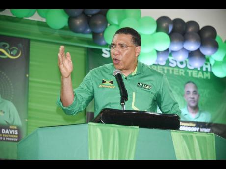 Prime Minister Andrew Holness, leader of the Jamaica Labour Party, addressing party supporters at the Homer Davis-led St James Southern constituency conference at Anchovy High School on Sunday.