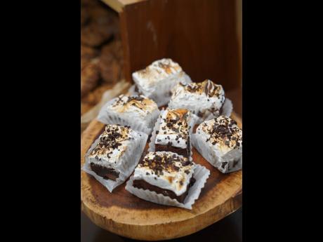 The array of sweet treats included a molasses cookie, a rum-infused apple pie, and a campfire-side brownie topped with a homemade marshmallow made by Rebecca Karram of Until We Eat Again.