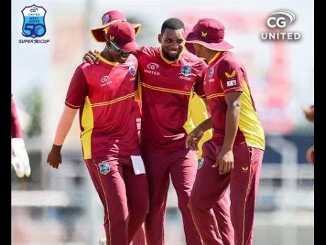 West Indies Academy players celebrate a wicket against the Guyana Harpy Eagles during a Super50 Cup cricket game at the Frank Worrell Memorial Ground yesterday.