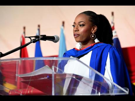 Valedictorian Aundrene Cameron, Bachelor of Laws with First Class Honours, addresses graduates at the University of the West Indies (UWI) graduation ceremony at UWI, Mona, yesterday.