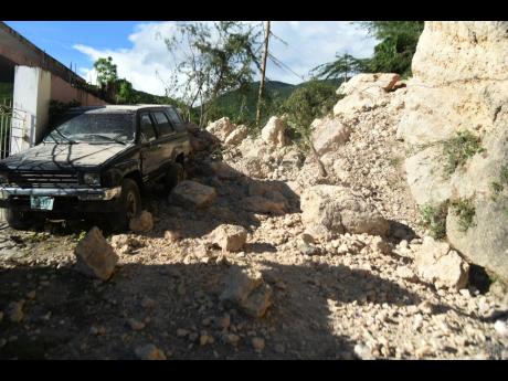 A massive landslide blocked the entrance to the community of Melbrook Heights. 