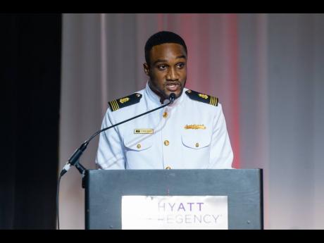  Caribbean Maritime University student Delroy Matherson speaks during the CSA’s gala about his experiences as the association’s Monica Silvera Scholarship recipient.