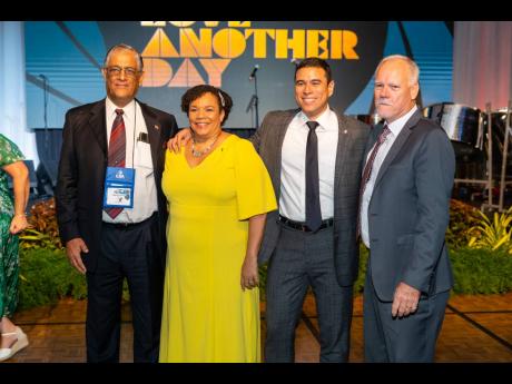 Marc Sampson (right), president of the Caribbean Shipping Association, is joined by past presidents (from left) Rawle Baddaloo, Corah Ann Sylvester Robertson and Juan Carlos Croston.