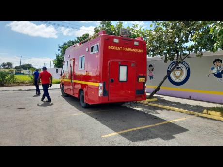 A Jamaica Fire Brigade incident command unit positioned outside the Greater Portmore High School after a security threat forced the evacuation of the St Catherine-based school on Thursday.