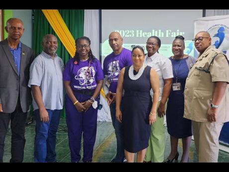 Pastor Wesley Boyne (second left) and some of the persons who participated in the opening ceremony of the Philadelphia Life Centre NYFDF health fair on Thursday. Others in the photo are (from left) Reginald Thorpe; Dr Joy Howell; Bishop Rayford Mott of Gen