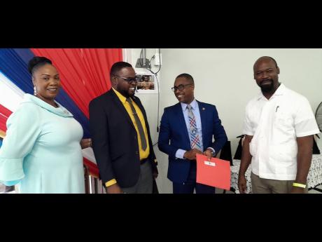 From right: Sam Sharpe Teachers’ College board member Reverend Ockery Brown; Sam Sharpe Teachers’ College principal Ricardo Bennett; education officer in the standards development unit of the School Improvement Services Branch, Ministry of Education an