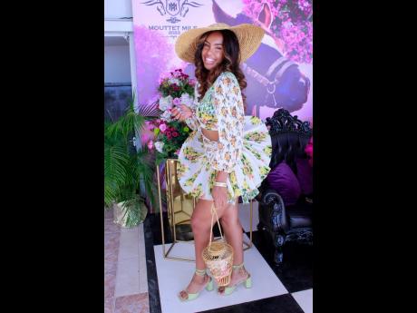 Captivating the spotlight with grace and style is social media influencer Kristia Franklin.