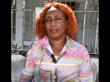 Forty-seven-year-old Angella Hewitt, the mother of Ajani Robinson, one of the students who died in Tuesday’s crash along the Petersfield main road in Westmoreland.