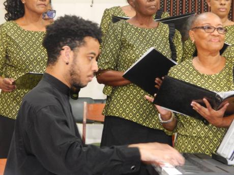 Pianist Stephen Shaw-Naar accompanying the National Chorale of Jamaica last Sunday at Hope United Church.