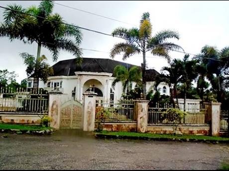 Andrew Hamilton’s US$1.55 million, or approximately J$230 million, mansion in  Mandeville, Manchester.