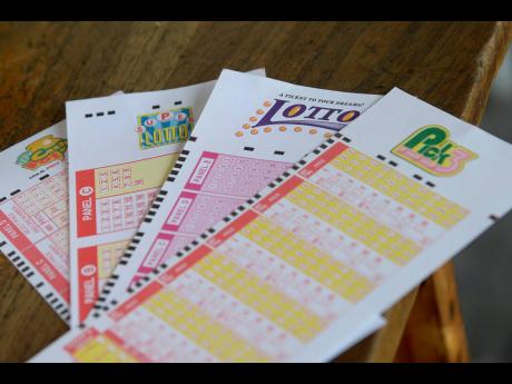 File photo of lottery tickets. Kristen Gyles writes: .. true or not, gambling-related marketing and advertisements tend to be misleading or untruthful.
