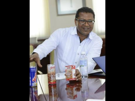 File 
In this July 2018 Gleaner photo, Seprod Group CEO Richard Pandohie speaks about some of the company’s products.