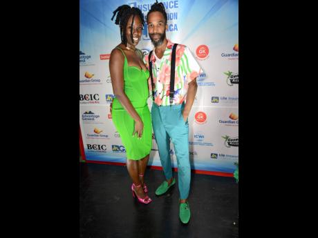 Akil Andrews and his wife, Yanique, added vibrant pops of green and pink to harmonise their outfits.