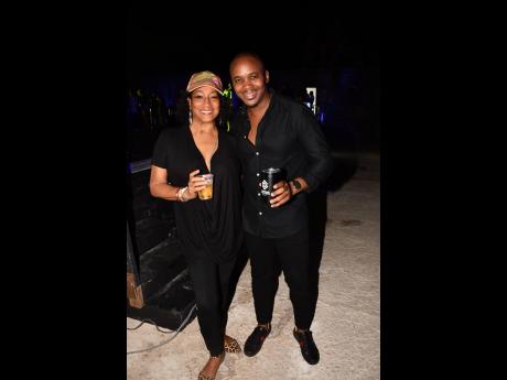 Heather Goldson, chief marketing officer of Supreme Ventures Limited enjoys a happy moment with Kamal Powell, head of marketing at Supreme Ventures Limited.
