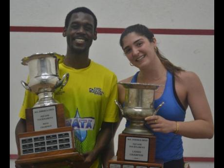 All Jamaica senior squash champions Julian Morrison and Mary Mahfood.