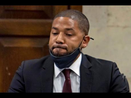 Actor Jussie Smollett listens as his sentence is read at the Leighton Criminal Court Building, Thursday, March 10, 2022, in Chicago. An appeals court last Friday upheld the disorderly conduct convictions of Smollett, who was accused of staging a racist, ho