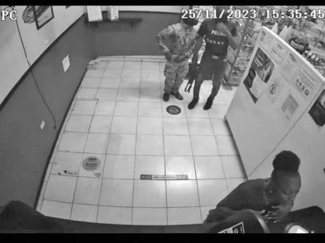 Last weekend, thugs armed with high-powered weapons and dressed in police and military uniforms escaped with an undetermined sum of cash following a brazen daylight robbery at a pharmacy in Linstead, St Catherine. Video footage shows one of the robbers wea